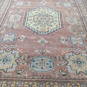 Handmade worsted wool and cotton area rug or runner with structured geometric Farsh-e-Nayle pattern displayed on floor