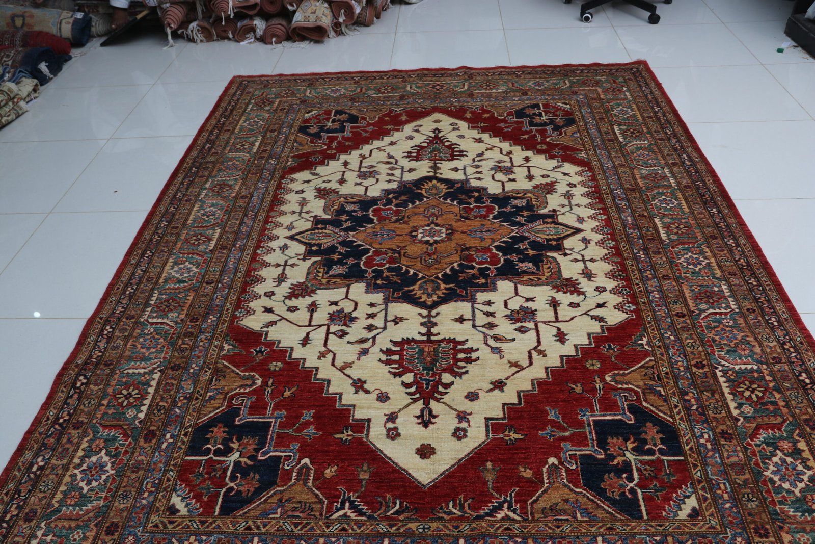 img 3861 Handmade wool and cotton area rug or runner with traditional geometric Kazak pattern displayed on floor