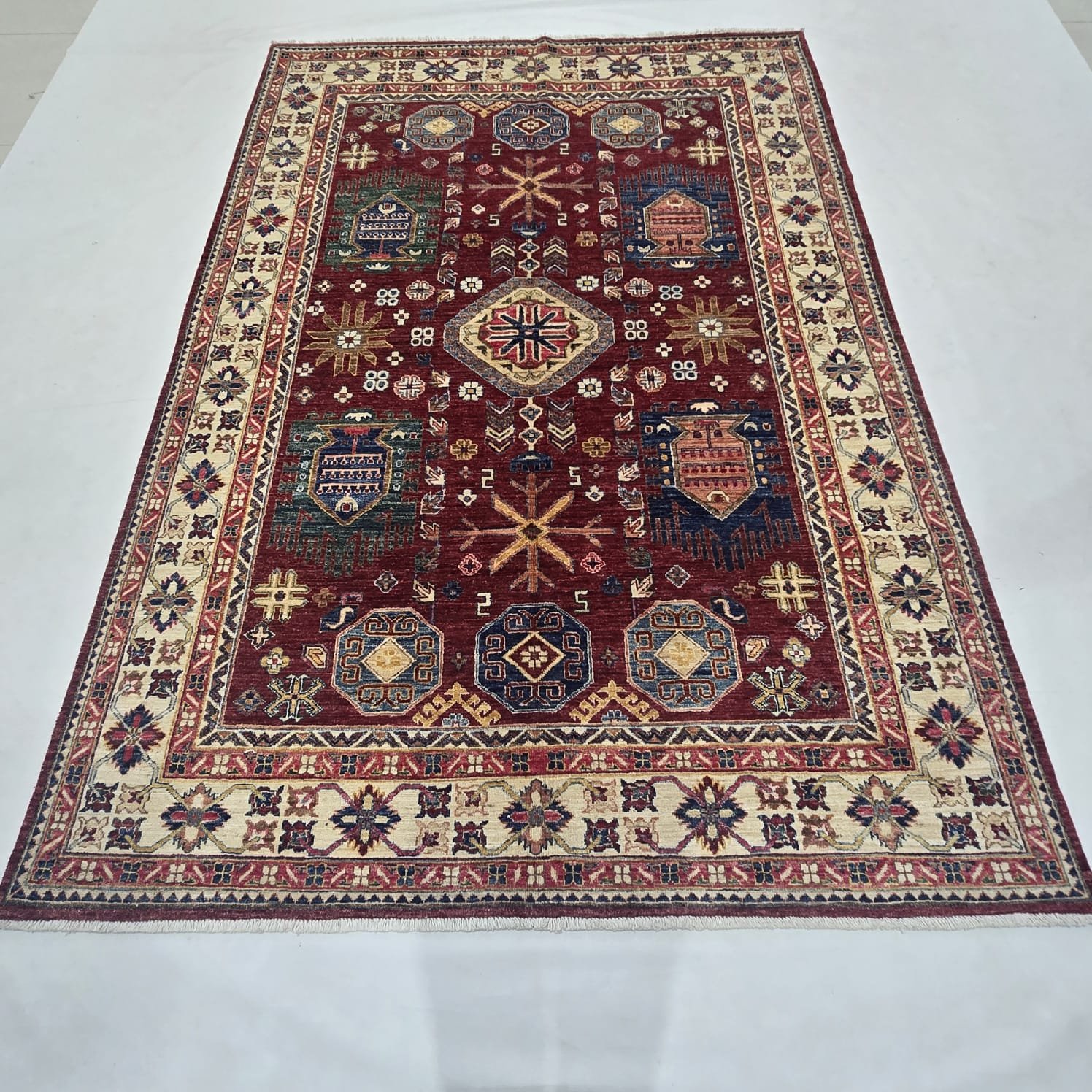 whatsapp image 2026 09 15 at 6.09.05 pm (1) Handmade wool and cotton area rug or runner with classic floral Tribal pattern displayed on floor